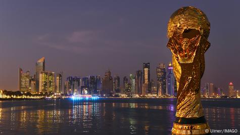 FIFA World Cup replica in front of skyscrapers in Qatar