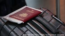MOSCOW, RUSSIA - JUNE 21, 2021: A passport and a suitcase are pictured at Vnukovo International Airport. Russia resumes flights with Turkey, suspended in April 2021 due to the COVID-19 pandemic, on June 22. Sergei Bobylev/TASS