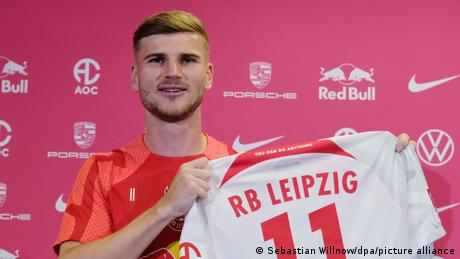 Timo Werner holds up Leipzig jersey