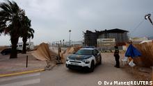A civil guard car comes out of the emergency exit at the venue of Medusa Festival, an electronic music festival, after high winds caused part of a stage to collapse, in Cullera, near Valencia, Spain, August 13, 2022. REUTERS/Eva Manez
