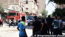 GIZA, EGYPT - AUGUST 14: Firefighters respond to fire broke out at the Abu Sifin in Giza, Egypt on August 14, 2022. Reports stated 35 worshippers died and multiple injured. Stringer / Anadolu Agency