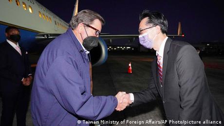 Taiwan Ministry of Foreign Affairs, from left, U.S. Democratic House members John Garamendi shakes hands with Donald Yu-Tien Hsu, Director-General, dept. of North American Affairs, Taiwan's Ministry of Foreign Affairs after arriving on a U.S. government plane at Songshan airport in Taipei, Taiwan 