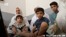 Title: Afghan family split up a year on
Description: Afghan family sits together on a sofa in Kabul
Credit: TOLO news for DW
Date: 15.08.2022
