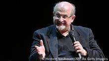 British author Salman Rushdie speaks as he presents his book Quichotte at the Volkstheater in Vienna, Austria, on November 16, 2019. - Austria OUT (Photo by HERBERT NEUBAUER / APA / AFP) / Austria OUT (Photo by HERBERT NEUBAUER/APA/AFP via Getty Images)