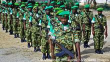African Union (AMISOM) soldiers from Burundi stand to attention in Mogadishu on July 11, 2017.
A contingent of Burundian soldiers stationed in Somalia under AMISOM command have taken part in a leaving and handover ceremony. The AMISOM military contingent has been using the National Somali university as its command headquarters since 2007. / AFP PHOTO / MOHAMED ABDIWAHAB (Photo credit should read MOHAMED ABDIWAHAB/AFP via Getty Images)