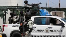 Members of security wait after they arrive at the airport to reinforce security, after vehicles were set on fire by unidentified individuals, in Tijuana, Baja California state, Mexico, August 13, 2022. REUTERS/Jorge Duenes
