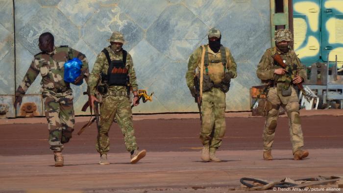 Three Russian mercenaries (right) in northern Mali.