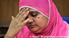 Bilkis Bano, one of the survivors of the Gujarat riot victims, gestures during a press conference in New Delhi, India, Monday, May 8, 2017. Bano was gang-raped and seven of her relatives, including her three-year old daughter, were killed during religious riots that broke out in Gujarat in 2002. Last week, a Mumbai court upheld the conviction of 11 Hindu men to life in prison for the rape and murder in one of the worst incidents of religious rioting in India. (AP Photo/Manish Swarup)