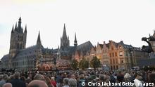 YPRES, BELGIUM - JULY 30: Crowds gather at Market Square Ypres for an event that will tell the story of the four years of war on the Salient on July 30, 2017 in Ypres, Belgium. The commemorations mark the centenary of Passchendaele - The Third Battle of Ypres. (Photo by Chris Jackson/Getty Images)