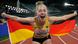 Leichtathletin Gina Lückenkemper jubelt nach ihrem Sieg 100 Meter bei der EM in München mit einer deutschen Fahne in Händen Leichtathletin Gina Lückenkemper jubelt nach ihrem Sieg 100 Meter bei der EM in München mit einer deutschen Fahne in Händen