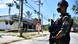 Thai military personnel guards convenience stores damaged after an attack Thai military personnel guards convenience stores damaged after an attack
