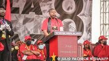 Angola incumbent President Joao Lourenco addresses an elections rally in Luanda on July 23, 2022. - Angolan President Joao Lourenco's quest for re-election couldn't come at a worse time, analysts say, with the recent death of his strongman predecessor, a struggling economy and soaring poverty looming large. Lourenco is seeking a second term in the August 24 vote that observers predict will be the tightest since the oil-rich country emerged from a lengthy civil war two decades ago. (Photo by Julio PACHECO NTELA / AFP)