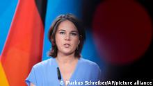 German Foreign Minister Annalena Baerbock, briefs the media after a meeting with her counterpart from Slovenia Tanja Fajon at the foreign ministry in Berlin, Germany, Friday, July 1, 2022. (AP Photo/Markus Schreiber)