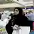 Saudi woman Salma al-Shehab speaks to a journalist five years ago at a book fair
