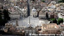 ITALY-HEALTH-VIRUS-MAYDAY-HERITAGE
This aerial photograph taken on May 1, 2020 shows the empty Piazza del Popolo in Rome on May day during the country's lockdown aimed at curbing the spread of the COVID-19 (the novel coronavirus). (Photo by Filippo MONTEFORTE / AFP) (Photo by FILIPPO MONTEFORTE/AFP via Getty Images)