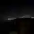 Una nube de humo se levanta sobre los edificios de Mogadiscio la noche del viernes, en medio del ataque al Hotel Hyat.