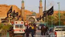 العراق ـ تواصل البحث وانتشال جثث جديدة من موقع انهيار مزار شيعي