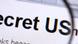 The WikiLeaks site on screen under a magnifying glass The WikiLeaks site on screen under a magnifying glass