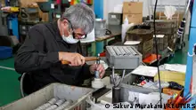A worker assembles an air drill at the factory of manufacturer Katsui Kogyo in Higashiosaka, Japan June 23, 2022. REUTERS/Sakura Murakami