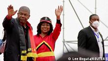 Angola's president and leader of the ruling MPLA Joao Lourenco and his wife Ana Dias Lourenco wave as they arrive to attend their party's final rally in Camama, on the outskirts of the capital Luanda, in Angola, August 20, 2022. REUTERS/Lee Bogata
