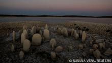 The dolmen of Guadalperal, also known as the Spanish Stonehenge, is seen due to the receding waters of the Valdecanas reservoir in the outskirts of El Gordo, Spain, August 3, 2022. REUTERS/Susana Vera