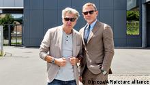IMAGE DISTRIBUTED FOR OMEGA - In this image released on Friday, Aug. 14, 2015, Nick Hayek, Swatch Group CEO, left, and Daniel Craig are seen at the inauguration of the OMEGA factory in Villeret, Switzerland. The actor who reprises his role as James Bond in SPECTRE, the 24th Bond adventure, was given a guided tour, as well as exclusive access to the factory¿s assembly line. During the visit he was also shown production of the new OMEGA Seamaster 300 ¿SPECTRE¿ Limited Edition. Images and press release available at http://www.omegawatches.com/news/international-news. (OMEGA via AP Images)