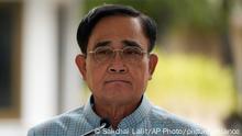 Thai Prime Minister Prayuth Chan-ocha arrives at Government house in Bangkok, Thailand, Tuesday, Aug. 16, 2022. On Monday, Aug. 22, 2022, Thailand's Constitutional Court received a petition from opposition members of the House of Representatives, seeking a ruling that could terminate Prime Minister Prayuth Chan-ocha's time in office this week because he may have reached the legal limit of how long he can hold the position. (AP Photo/Sakchai Lalit)
