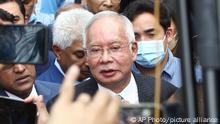 Former Malaysian Prime Minister Najib Razak, center, speaks to supporters outside at Court of Appeal in Putrajaya, Malaysia Tuesday, Aug. 23, 2022. Malaysia’s top court has upheld Najib’s conviction and 12-year jail sentence in a graft case linked to the looting of the 1MDB state fund. Najib’s loss in his final appeal means he will have to begin serving his sentence immediately, becoming the first former prime minister to be jailed. (AP Photo)