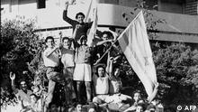 (FILES) Young Jews celebrate 14 May 1948 in Tel Aviv the proclamation of a new state of Israel. Israel was founded 14 May 1948 in Tel Aviv by the Jewish National Council. On November 29, 1947, the United Nations' General Assembly voted resolution 181 on the division of Palestine in two states, one Jewish and one Arab. The State of Israel was proclamed on 14 May 1948 by the Jewish National Council and was recognized by the United States and the Soviet Union 15 and 17 May the same year. Arab States of Lebanon, Syria, Jordan, Egypt and Iraq crossed the borders from north, east and south with their regular armies 15 May 1948. Agreements signed in 1949 between Israel and the Arab States ended the 1948 Arab-Israeli War, and established the armistice lines between Israel and the West Bank, also known as the Green Line, until the 1967 Six-Day War. (Photo by AFP FILES / AFP)