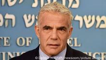 Israeli Prime Minister Yair Lapid speaks about Iran at a security briefing for the foreign press at the Prime Minister's office in Jerusalem, Wednesday, Aug. 24, 2022. Lapid called on U.S. President Joe Biden and Western powers to call off an emerging nuclear deal with Iran, saying an agreement would fail to prevent Iran from developing a nuclear bomb and reward it with billions of dollars to fund Israel's enemies. Israel's caretaker prime minister used stark language on Wednesday in his criticism of the expected agreement. (Debbie Hill/Pool via AP)
