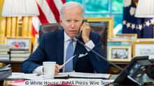 July 28, 2022, Washington, District of Columbia, USA: President JOE BIDEN posted a photo of him on social media speaking on the phone after a lengthy two hour phone call with Chinese President Xi JinpinG. Biden talked with Jinping in their first direct conversation in four months as tensions have risen over Taiwan. China's Xi reportedly told Biden on Taiwan 'those who play with fire perish by it.' (Credit Image: © White House/ZUMA Press Wire Service