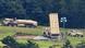Unidade do THAAD com caminhões, lançadores e soldados