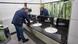 Archive image of a truck driver in a German highway service station toilet washing his hands. Archive image of a truck driver in a German highway service station toilet washing his hands.