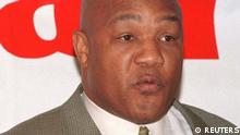 FILE PHOTO: Boxer George Foreman, former heavyweight world champion, poses after a news conference December 1 in Beverly Hills, where he and Larry Holmes announced their upcoming bout scheduled for January 23, 1999 at the Astrodome in Houston, Texas.
FSP/SV/File Photo