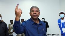 Angola's President and leader of the People's Movement for the Liberation of Angola (MPLA) ruling party Joao Lourenco gestures after casting his vote in a general election in the capital Luanda, Angola August 24, 2022. REUTERS/Stringer