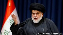 FILE PHOTO: Iraqi populist leader Muqtada al-Sadr delivers a televised speech in Najaf, Iraq August 3, 2022. REUTERS/Alaa Al-Marjani/File Photo