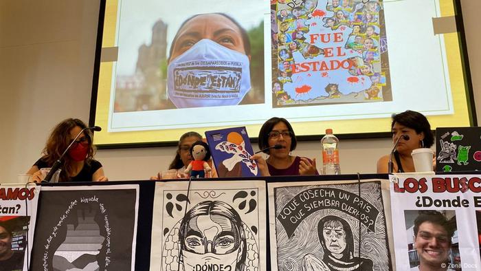 Artists and organizers speak at a panel to discuss their work with families of disappeared persons.