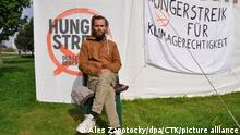 Climate activist Jacob Heinze sits in a protest camp near the German parliament in Berlin, September 23, 2021. Jacob Heinze finished a hunger strike for a radical climate change after 23 days. (CTK Photo/Ales Zapotocky)