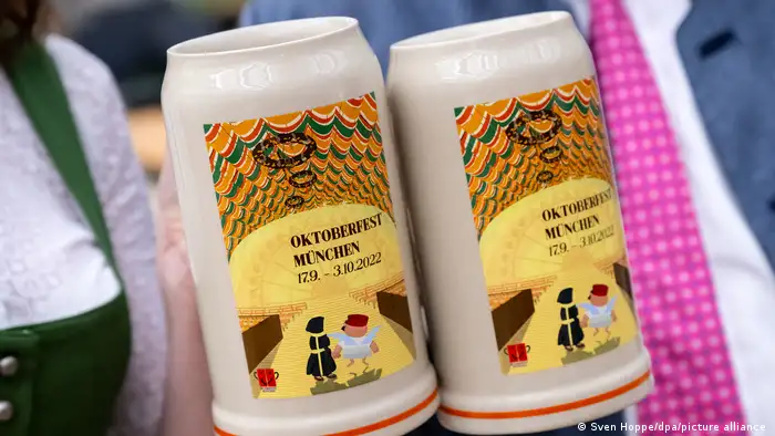 Two official Oktoberfest 2022 beer mugs.