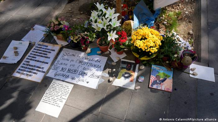  Flowers are left where street vendor Alika Ogochukwu was killed, in Civitanova Marche, Italy, 