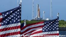 Artemis 1 is framed by American Flags as it sits on the Launch Pad 39B on August 30, 2022 shortly before it was announced that NASA plans to launch the moon mission on Saturday, September 3, 2022 at Kennedy Space Center, Florida. The mission was scrubbed on Monday due to an engine issue. NASA's SLS rocket with the Orion capsule atop is the first step for the United States to send astronauts back to the moon after 50 years. Photo by Pat Benic/UPI Photo via Newscom picture alliance
