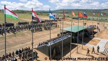 Participants attend a ceremony opening Vostok 2022 military exercises at a firing ground in the far eastern Primorsky region, Russia, August 31, 2022. Russian Defence Ministry/Handout via REUTERS ATTENTION EDITORS- THIS IMAGE HAS BEEN SUPPLIED BY A THIRD PARTY. NO RESALES. NO ARCHIVES. MANDATORY CREDIT