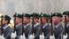 Donald Tusk and Angela Merkel walk in front of German soldiers at a welcoming ceremony Donald Tusk and Angela Merkel walk in front of German soldiers at a welcoming ceremony