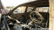 A burnt vehicle is pictured on a street aftermath of clashes among rival Shiite Muslim militants in Basra, Iraq September 1, 2022. REUTERS/Essam al-Sudani