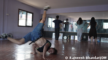 1.09.2022
Breakdancing in Nepal
Description: Lama does a handstand in Kathmandu
