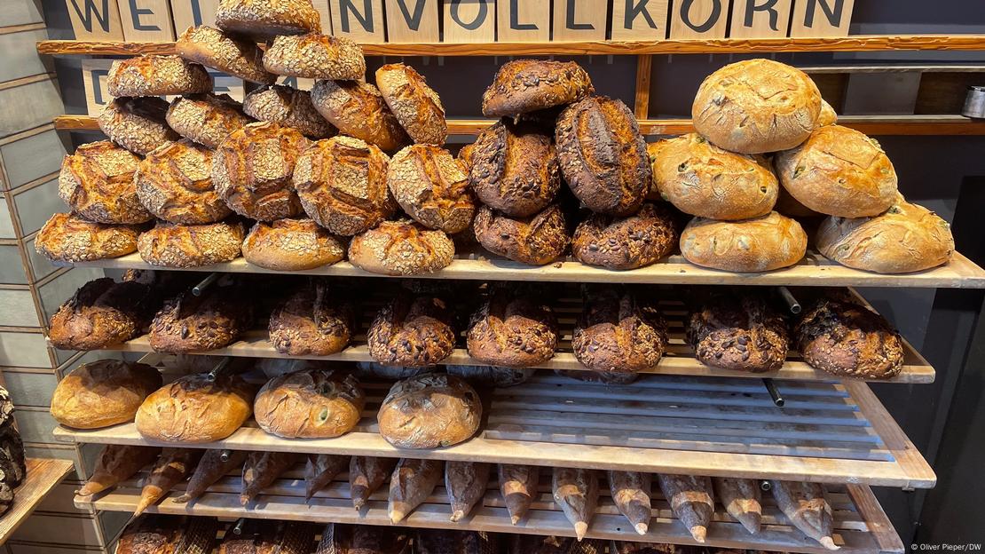 Stacks of different kinds of bread on display