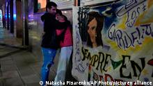 01.09.2022
A couple who witnessed when a man pointed a gun at Argentina's Vice President Cristina Fernandez during an event in front of her home in the Recoleta neighborhood of Buenos Aires, Argentina, comfort each other, Thursday, Sept. 1, 2022. (AP Photo/Natacha Pisarenko)