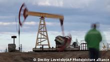 FILE - This Saturday, Sept. 10, 2011 file photo shows an oil rig near the town of Usinsk, 1500 km (930 miles) northeast of Moscow, Russia. Russia and Saudi Arabia said Monday May 15, 2017, they want to extend oil production cuts through the first quarter of 2018, in a move the two major producers say would support the market price. (AP Photo/Dmitry Lovetsky, File)