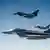Three Eurofighter jets flying in formation