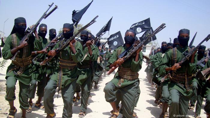 A file photo of al-Shabab militants marching with rifles